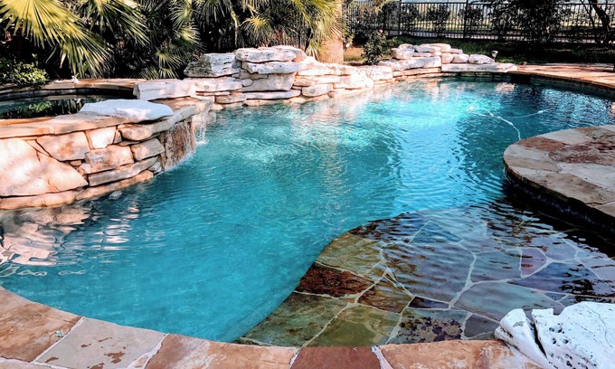 Falconhead House | Luxurious 5-bedroom Rental with Pool, Hot Tub and Putting Green!