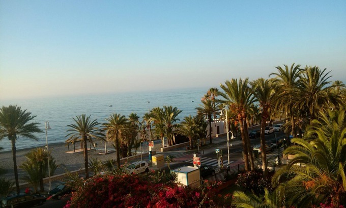 Velilla-Taramay Condo | LUXURIOUS APARTMENT WITH SEA VIEW, WIFI, SATELLITE TV FOR UP TO 6 PEOPLE. BIKES
