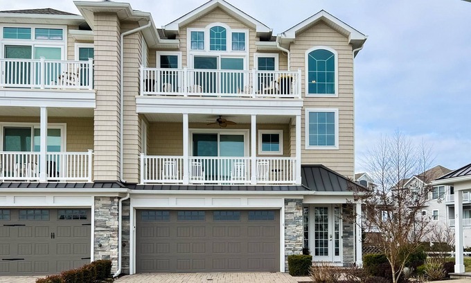 Ocean City House | Luxurious coastal getaway with multiple balconies, patio, & stunning ocean views