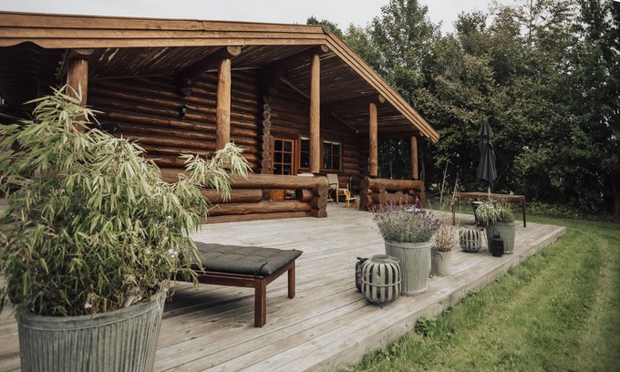 Dalby Huse House | Luxurious log house near water and forest