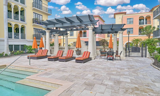 Estero Condo | Luxurious Top Floor unit at The Residence at Coconut Point