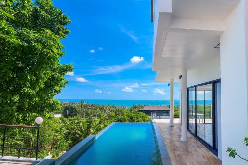 Nong Chaeng Villa | Luxury 4 bedroom 4 bathroom sea view bathtub pool villa in Bangpor Beach, Koh Samui, Thailand