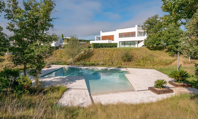 Caldes de Malavella Villa | Luxury architect design 4 bedroom villa at 5 star resort. Private garden. Pool.