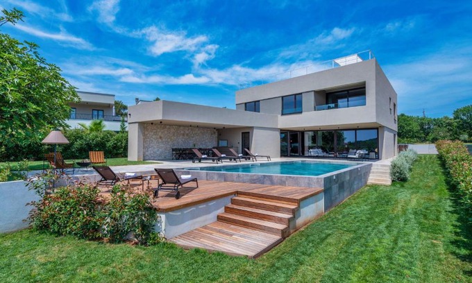 Banjole Villa | Luxury beachside villa with a pool and a sea view