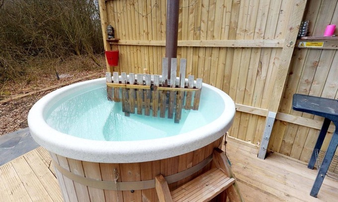 Priors Marston RV Rental | Luxury cosy tipi with Log burning Scandinavian hot tub. Perfect night