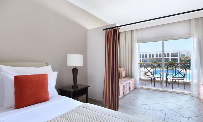 Sharm El Sheikh Hotel | Luxury All‑Inclusive Escape w/12 Pools, Waterslide, Spa, Swim‑Up Bar & Evening