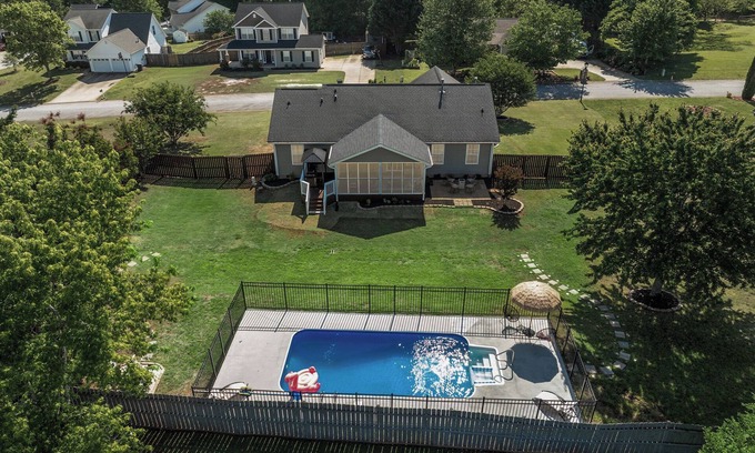 Greer House | Luxury Getaway with huge, fully fenced yard, Pool & Porch in Greer SC