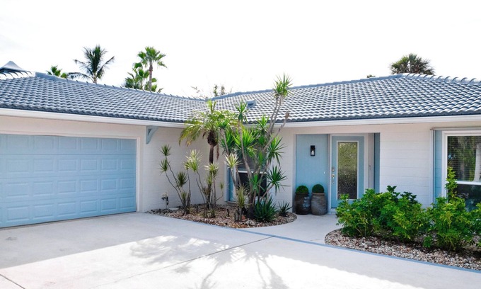 Holmes Beach House | Luxury ground, pet friendly - king suites, heated pool & hot tub - canal!