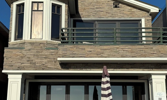 West Newport House | Luxury Oceanfront Home with Rooftop Deck, Hot Tub, Fire Pit