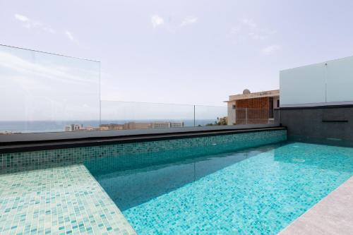 Carihuela Apartment | Luxury Townhouse with Rooftop Infinity Pool and Ocean Views