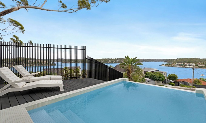 Kyle Bay House | Luxury Waterside Sanctuary with pool, sensational views, 2 decks & lift!