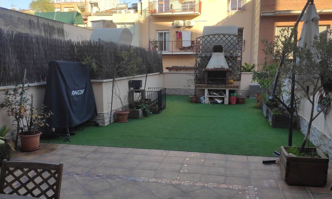Sant Feliu de Llobregat Apartment | Magnificent apartment with a large patio. 30 minutes from the center of Barcelona.