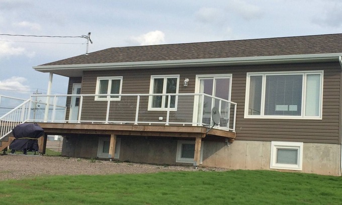 Cheticamp House | Main Floor (Unit 1) in House, Deck, Sunset, Water View (Cheticamp Harbour)