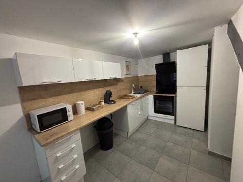 Pont-de-Larn House | Maison cosy et chaleureuse