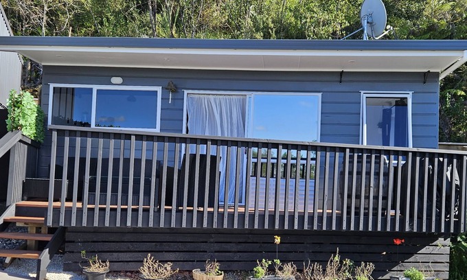 Mangonui Cottage | Mangonui, Outstanding Harbour Views From This Cute Cottage