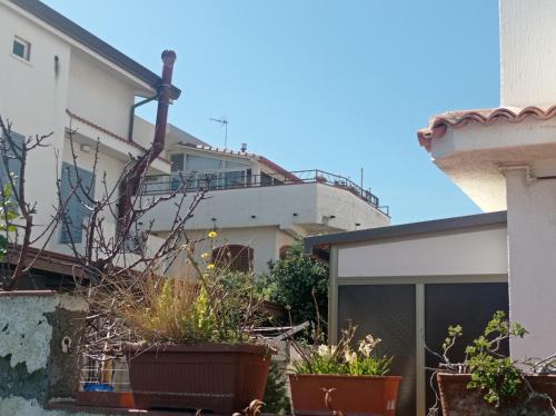 Oliveri House | Mansarda con terrazzo vista mare