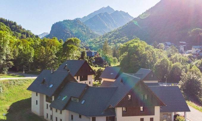 Saint-Colomban-des-Villards House | Mountain Charm & Comfort: Family Apartments | BBQ Facilities, Pets Allowed!