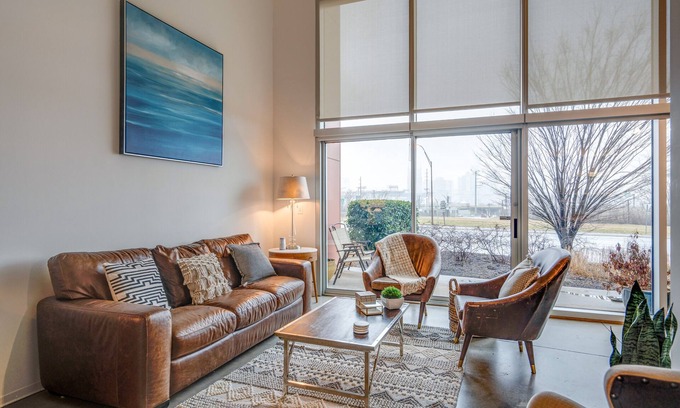 East Nashville Condo | Modern 2-Story Loft with Skyline Views, Balcony & 2 Living Areas