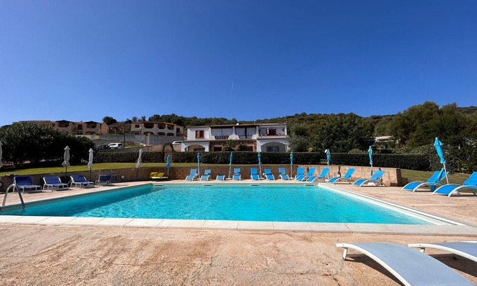 Budoni Apartment | Modern apartment with sea view and pool