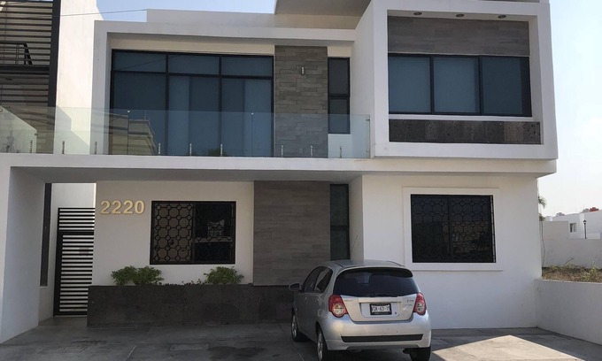 Zona Dorada Condo | Modern Apt 1st level with rooftop 5 min from the beach. (WiFi,Cable,AC,Boiler)