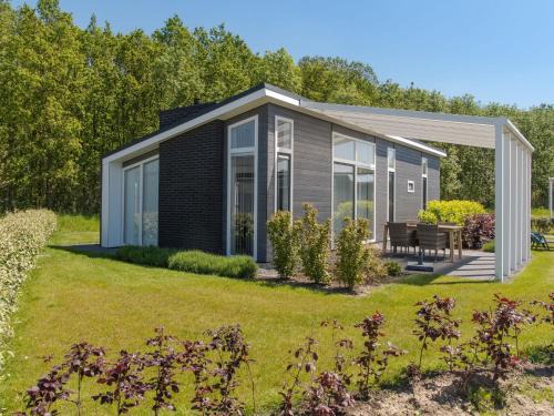 Wemeldinge House | Modern Chalet by Forest in Zeeland