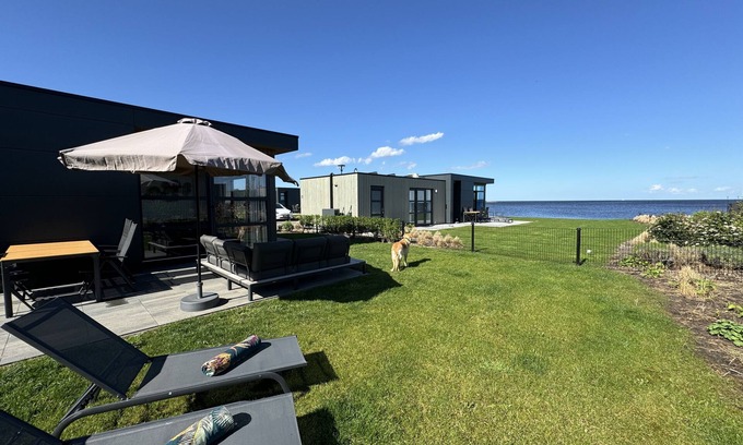 Enkhuizen House | Modern Chalet with Exceptional Lake Views, Private Fenced Garden, Near the Beach