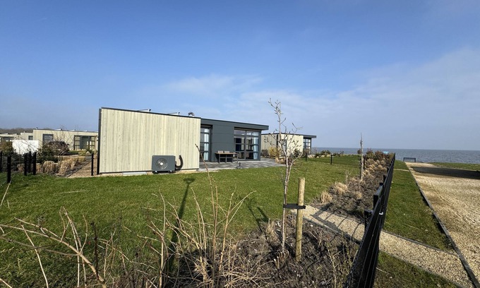 Enkhuizen House | Modern chalet with exceptional sea views, fenced garden and direct beach access