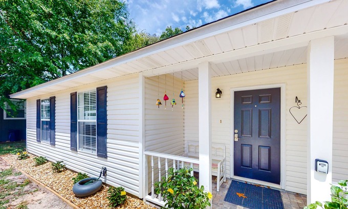 Gulfview Heights House | Modern dog-friendly home near the Gulf with yard, grill, screened porch & bikes
