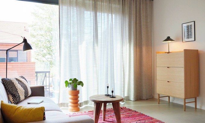 Hohwacht Apartment | Modern duplex apartment with rooftop terrace.