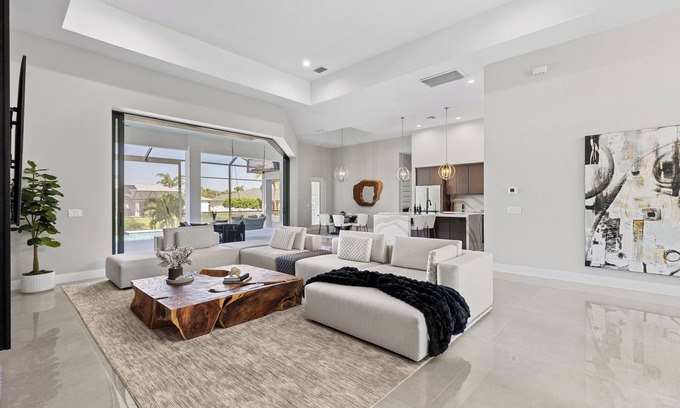 Cape Coral Villa | Modern Luxury Gulf-Access Retreat - Heated Pool & Spa -Sleeps 9