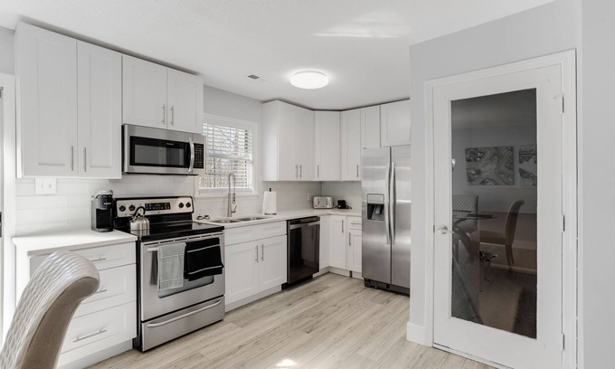 Drayton House | Modern retreat Style Home with Game room