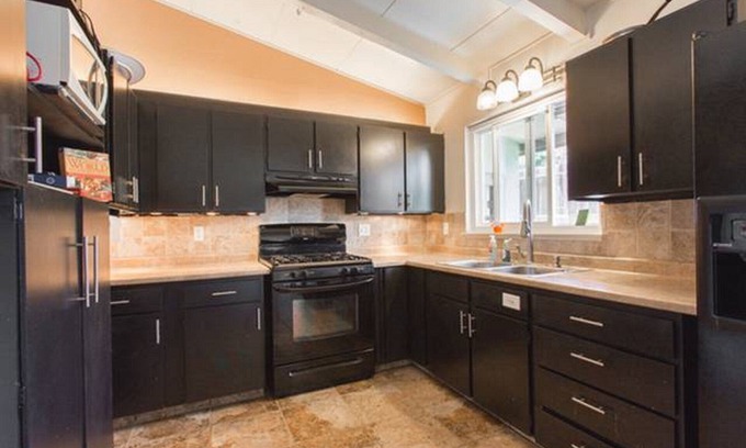 Mescal Corridor NW House | Monterey craftsman style home with vaulted exposed-beams ceiling hardwood floor