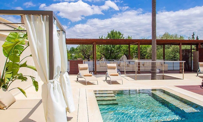 Establiments Villa | My Rental Homes | Villa The World with salted pool, garden and a gym room