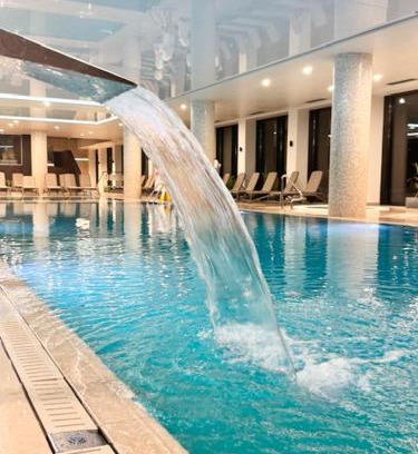 Dzielnica Uzdrowiskowa Apartment | Nadmorskie Tarasy Apartament SORRENTO z garażem,basen, sauna,jacuzzi