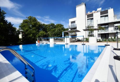 Dzielnica Uzdrowiskowa Apartment | Nadmorskie Tarasy z basenami - Kołobrzeg NAVIGATOR