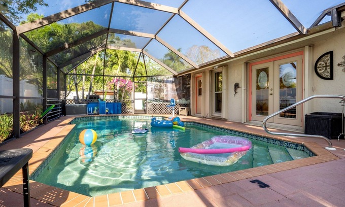 North Naples House | Naples Retreat, Game Room + Pool, Table & Darts, Fenced Yard, Pet Friendly