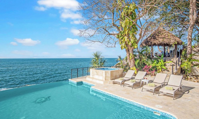 South Shore Hotel Area Villa | NEW! 2 Infinity Pools - Oceanfront Luxury Villa