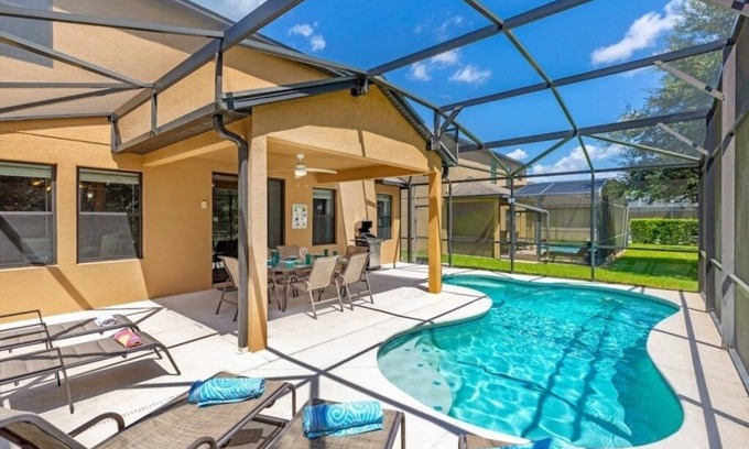 Cypress Pointe Villa | NEW! Luxury 4BR Retreat w/Pool, Game Room & Close to Disney Attractions