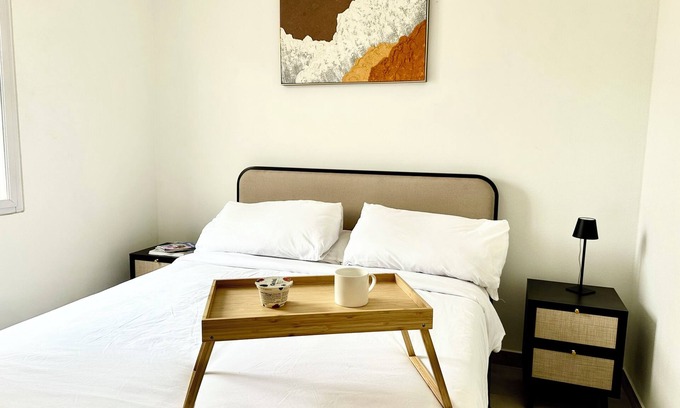 Oranjestad Apartment | New Modern 1B Apt Kitchen & TV