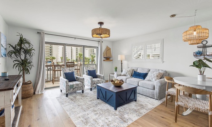 Orange Beach East Condo | New Owner Special! Stylish Riverfront Condo with Pool & Beach Access