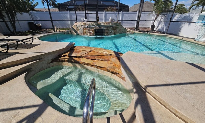 Naples Park House | NEW! Upscale House, Spectacular Heated Pool & Spa, FREE Bikes, Amenities, Beach