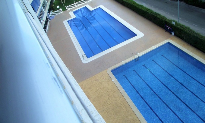 Punta Prima Apartment | Newly refurbished apartment with lifts; pool and 5min walk to beach/shops.