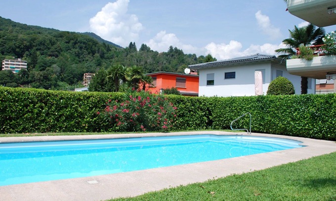 Caslano Apartment | Nice apartment for 4 people with pool, WIFI, TV, patio and pets allowed
