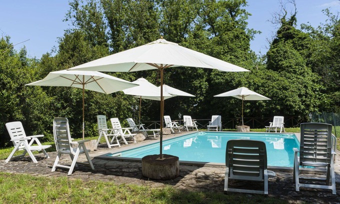 Capraccia Villa | Nice apartment in villa for 4 guests with WIFI, pool, TV, patio and pets allowed