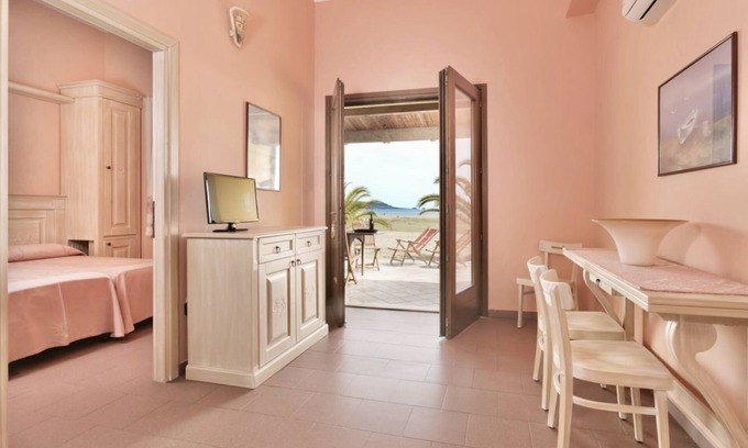 Bosa Marina Apartment | Nice apartment on the ground floor with sea view of approximately 55 m2 equipped with air conditioning and wi fi connection, composed of a living room with equipped kitchenette, fridge and flat-screen television.Two double or twin bedrooms and bathroom w