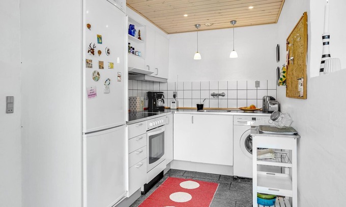 Hejsager Strand Apartment | Nice cottage at the end of a street with sea view.
