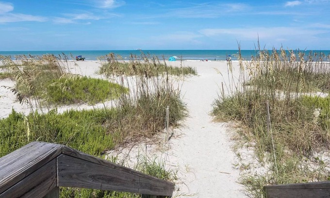Cocoa Beach House | Ocean Oasis: Heated Pool Access, All Beach extras, Bikes, Surfboards, Putt Putt