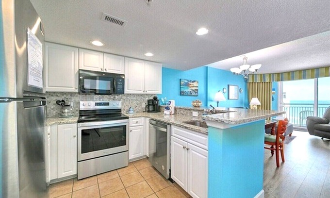 Myrtle Beach Condo | Oceanfront Bliss – Bright Blue Condo with Balcony & Beach Views
