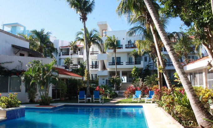 Akumal Condo | Oceanfront double size beach condo in La Sirena condominium