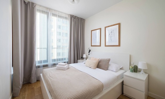 Mirow Apartment | Ogrodowa Peaceful White Apartment